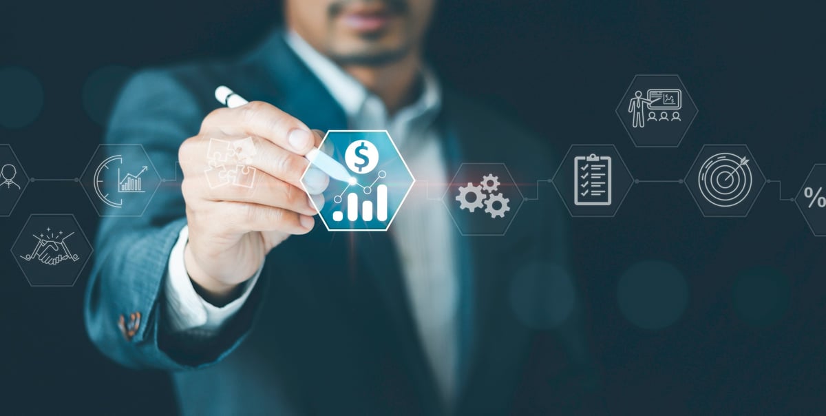 Executive reviewing a company income and expenses forecast